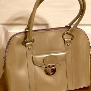 Beijo Designer Purse . The color is between a beige and taupe gray.